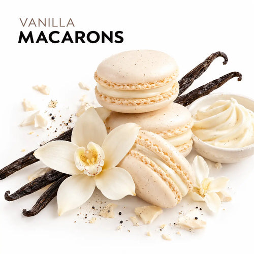 Three vanilla macarons with cream filling are arranged on a white background with vanilla beans, vanilla flowers, crumbs, and a small bowl of whipped cream. The words 'VANILLA MACARONS' appear at the top left.