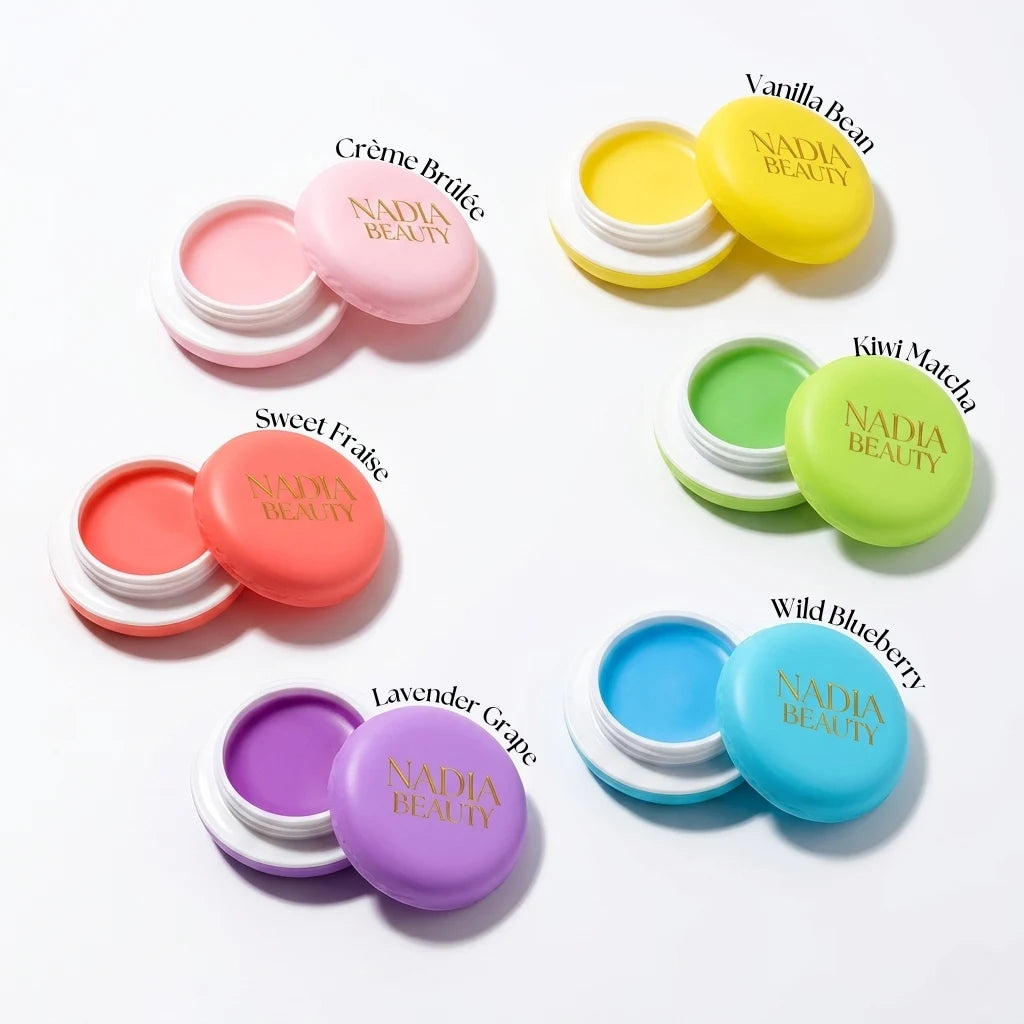 Collection of colorful lip balms with 'Nadia Beauty' branding on a white background.